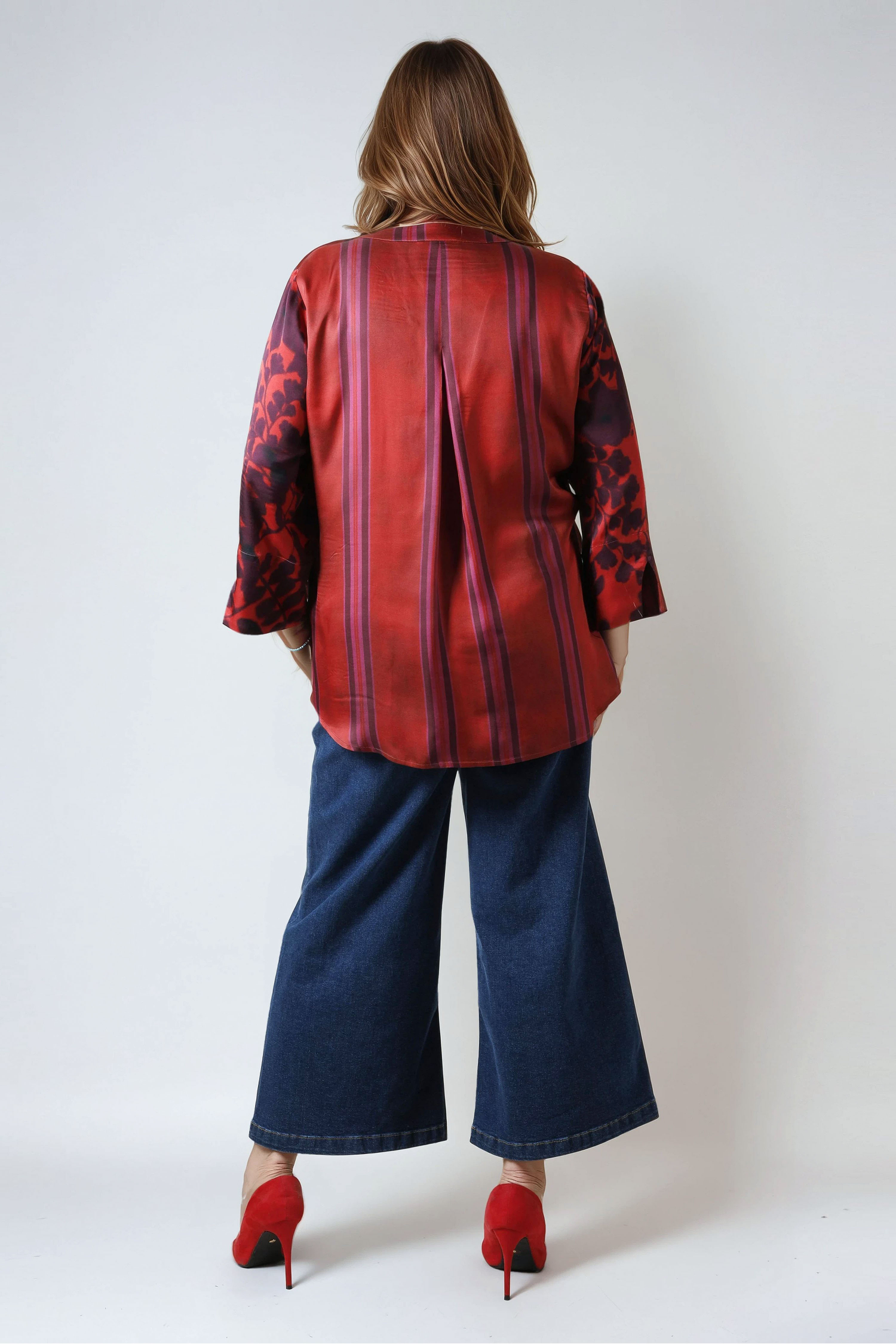 Printed blouse with a satin effect base.