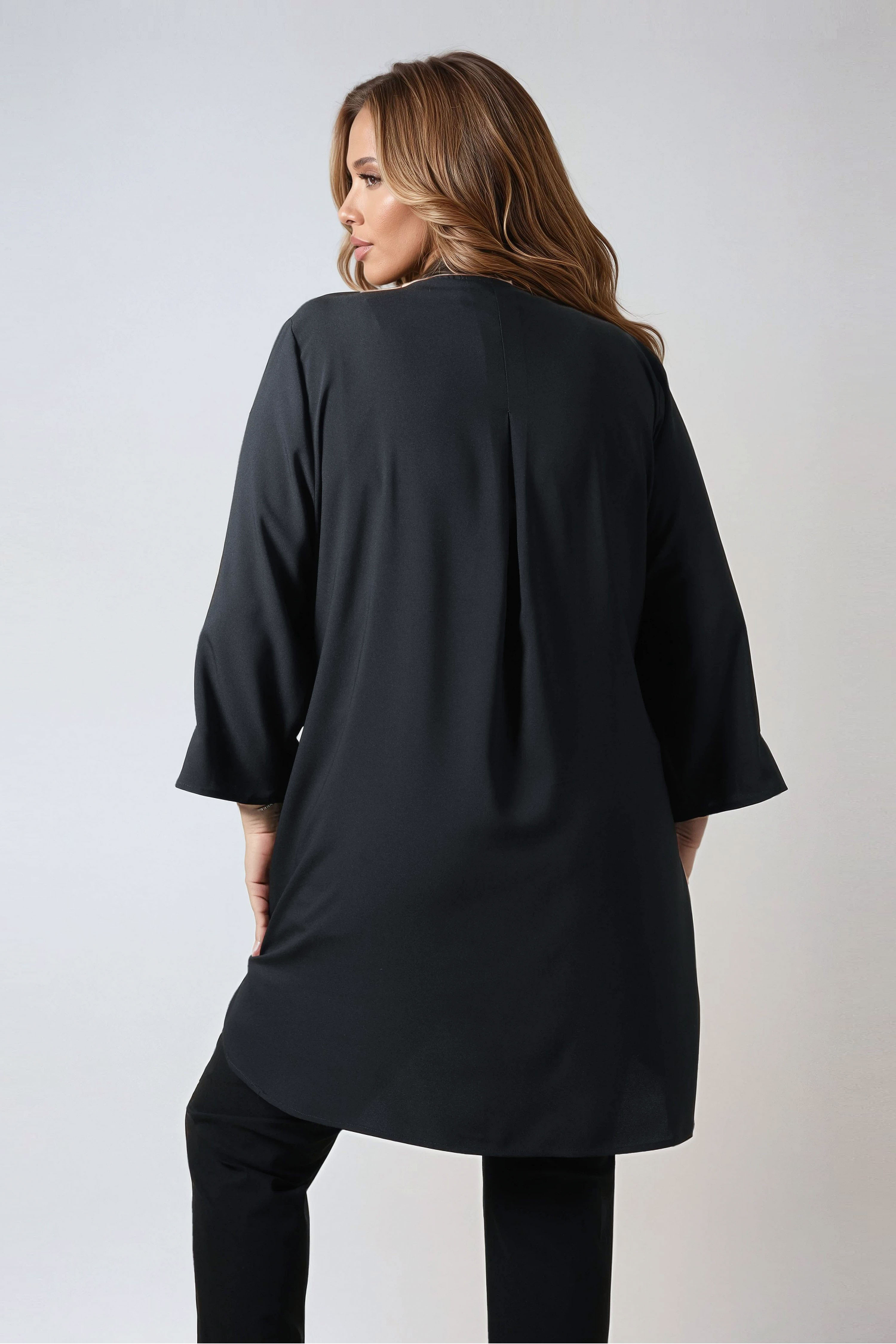 Plain tunic decorated with silver eyelets in polyviscose crepe 