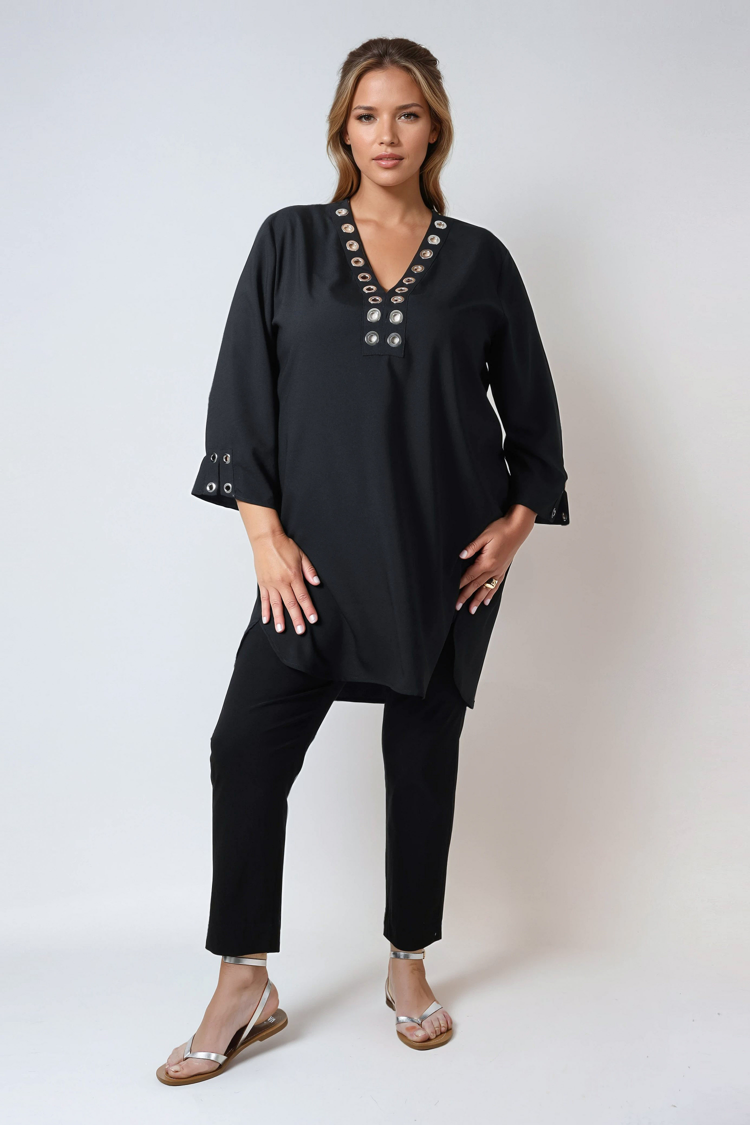 Plain tunic decorated with silver eyelets in polyviscose crepe 