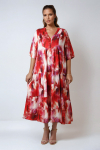 Long printed dress with a buttoned bib