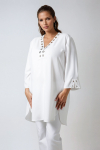 Plain tunic decorated with silver eyelets in poly viscose crepe 