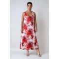 Long sleeveless dress in printed mesh.