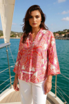 Printed blouse with a satin effect base.
