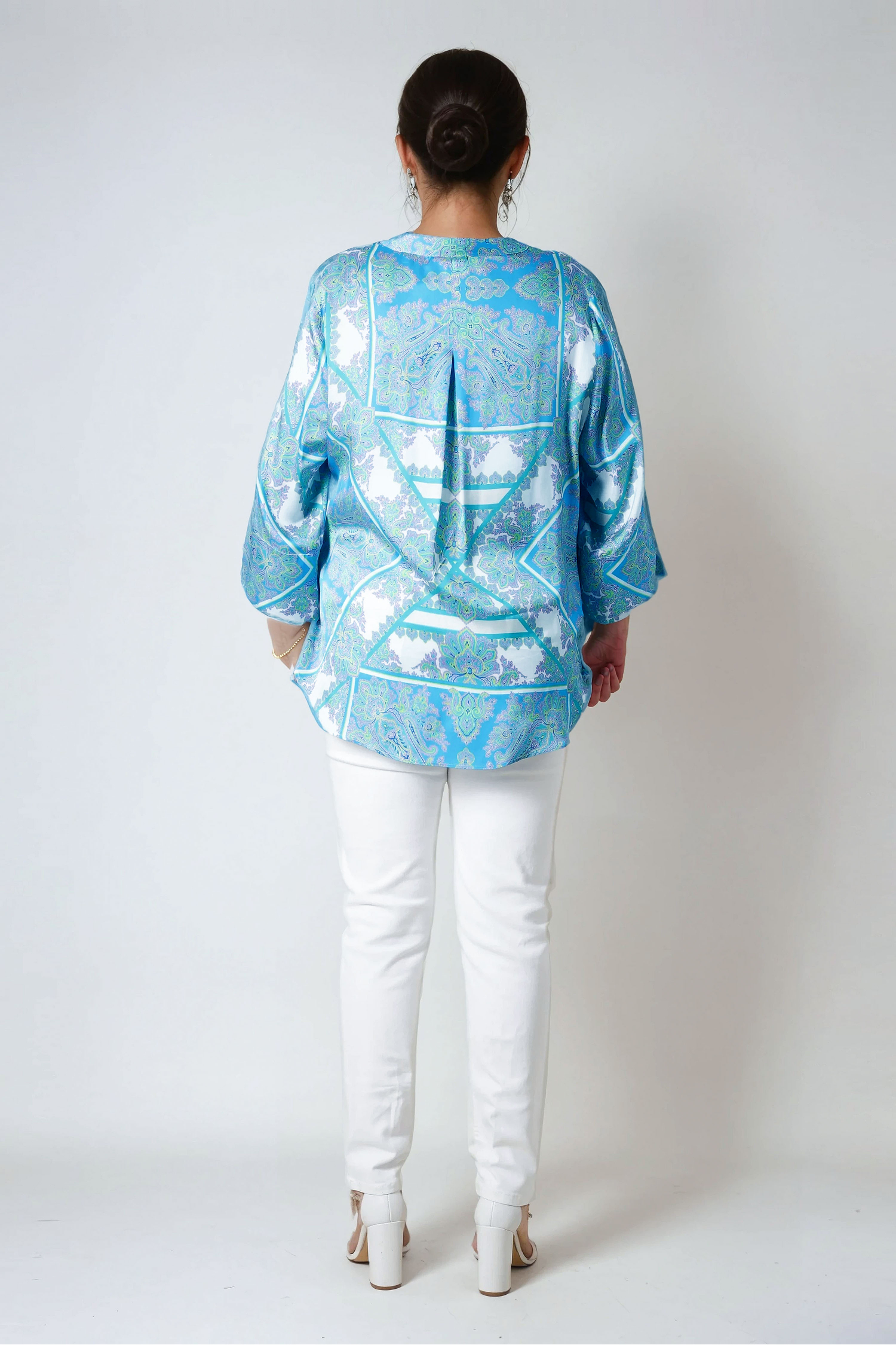 Printed blouse with a satin effect base.