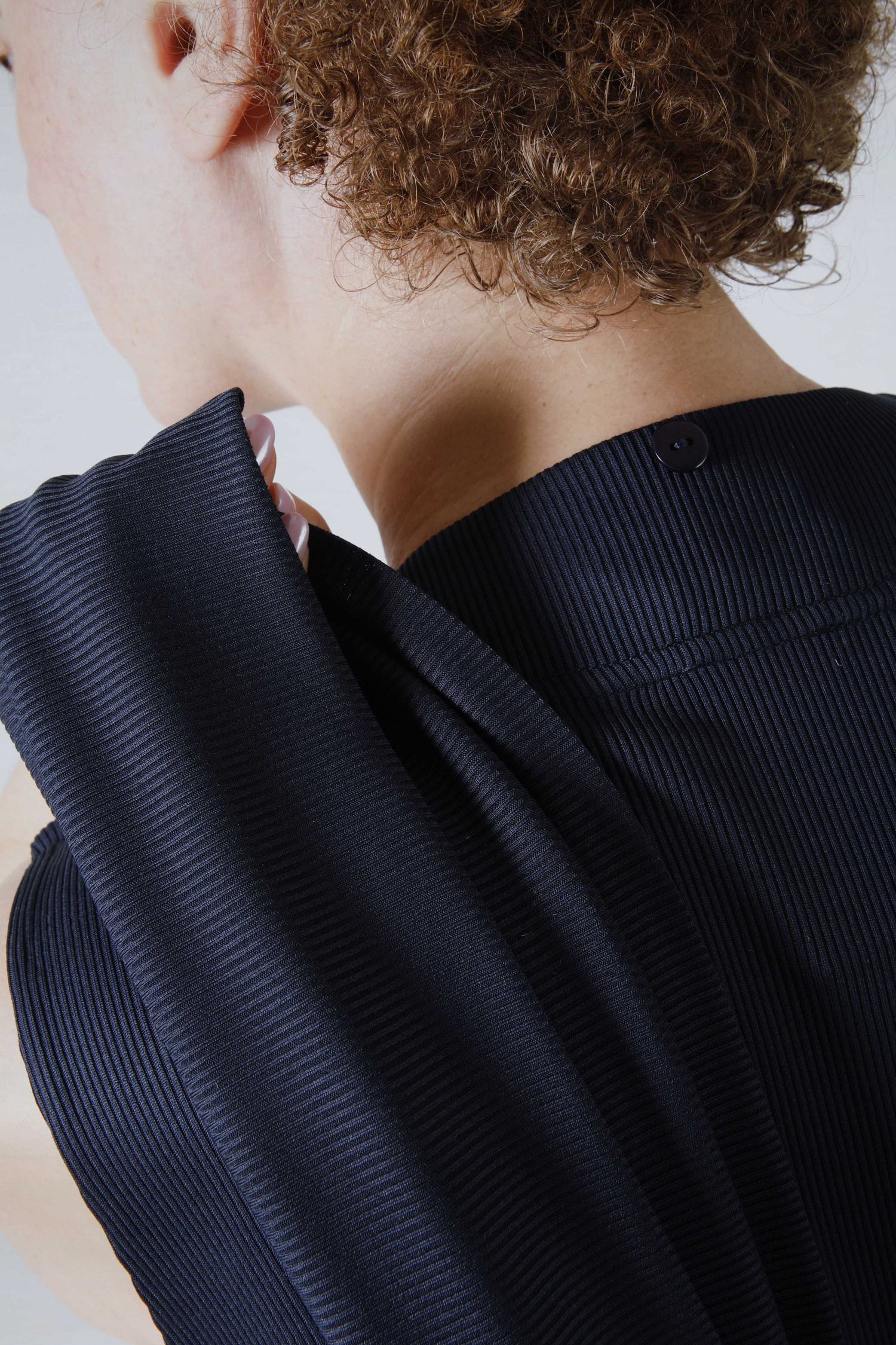Cascading front ribbed knit vest