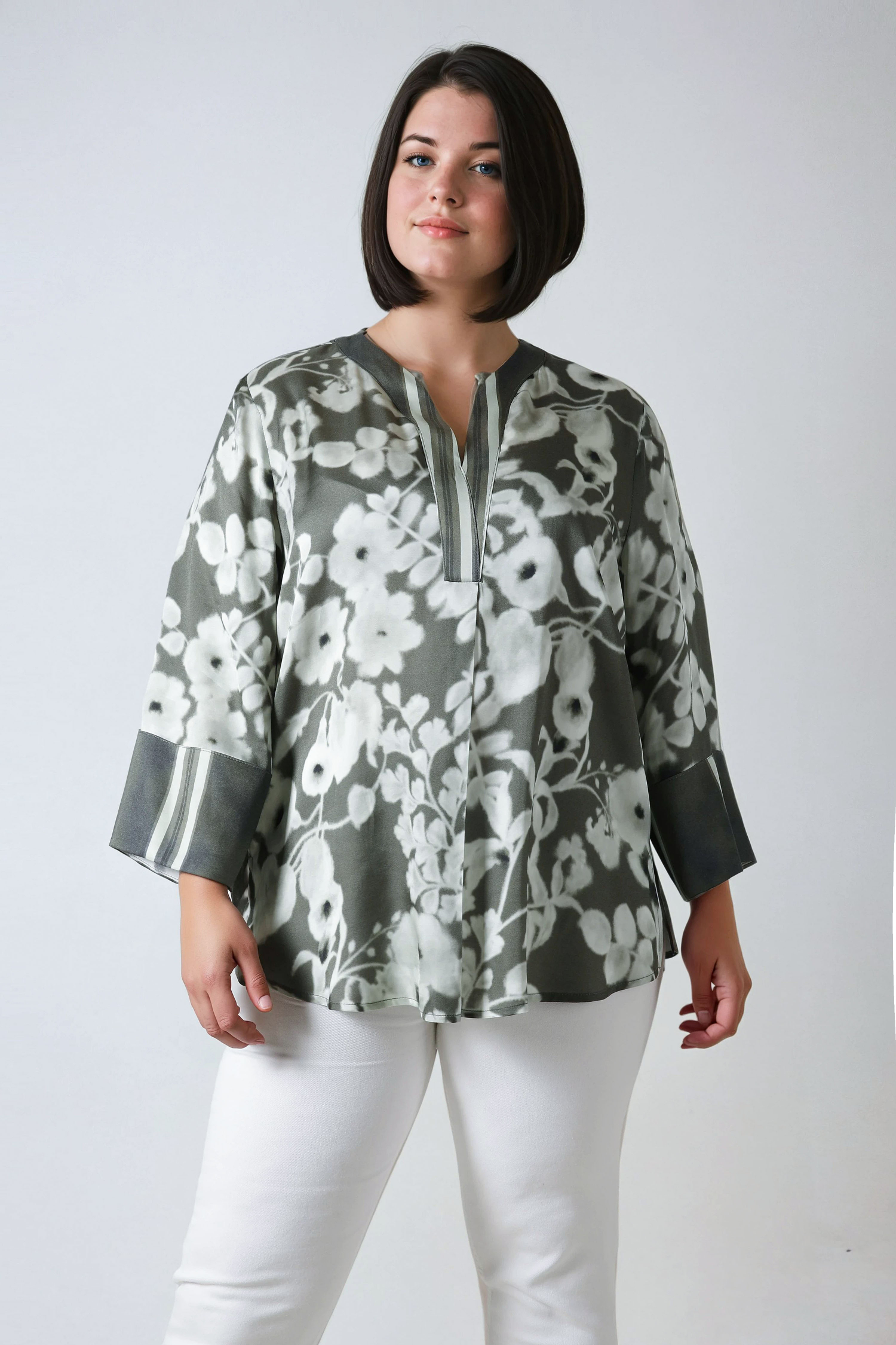 Printed blouse with a satin effect base.
