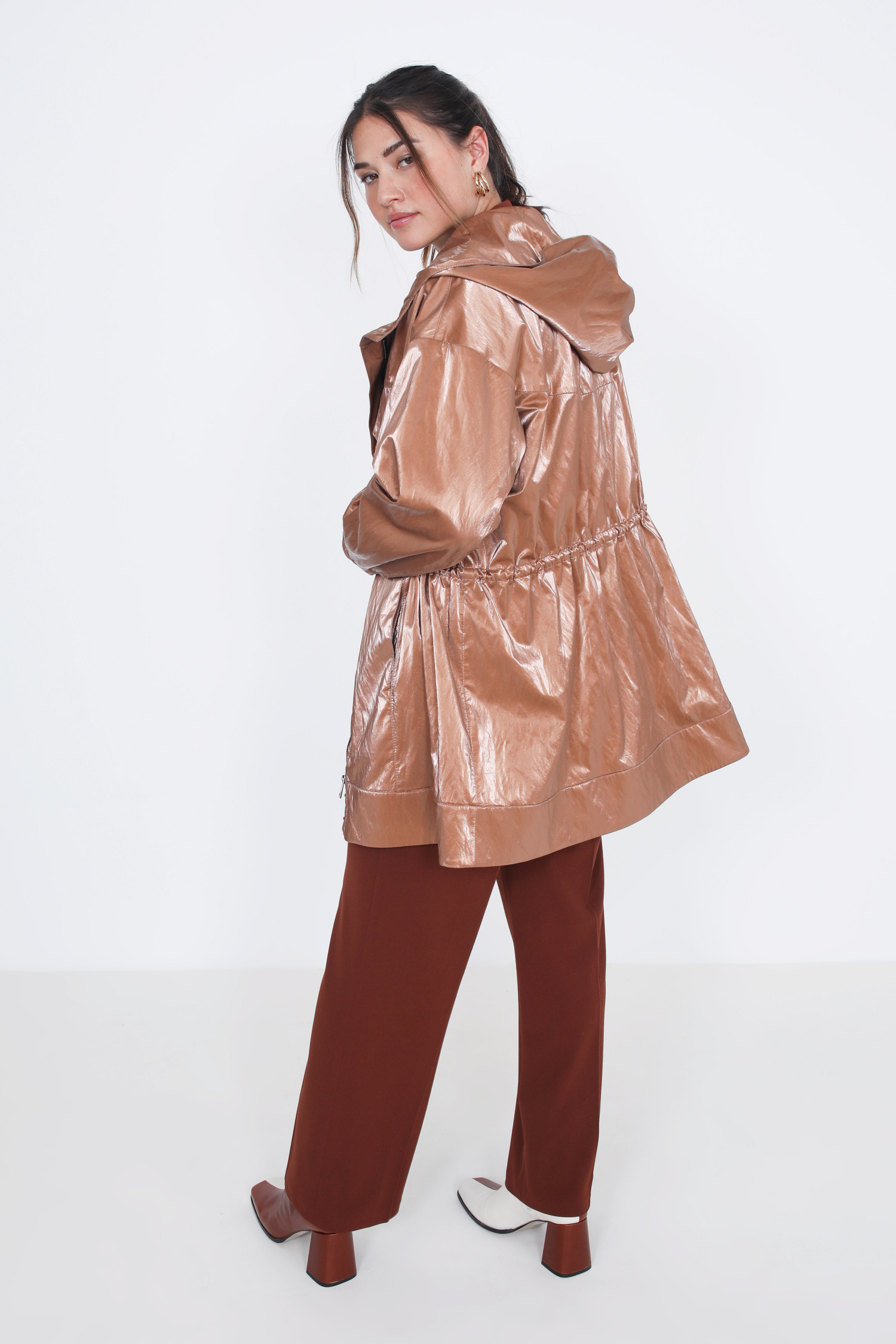 Waterproof vinyl parka with hood.