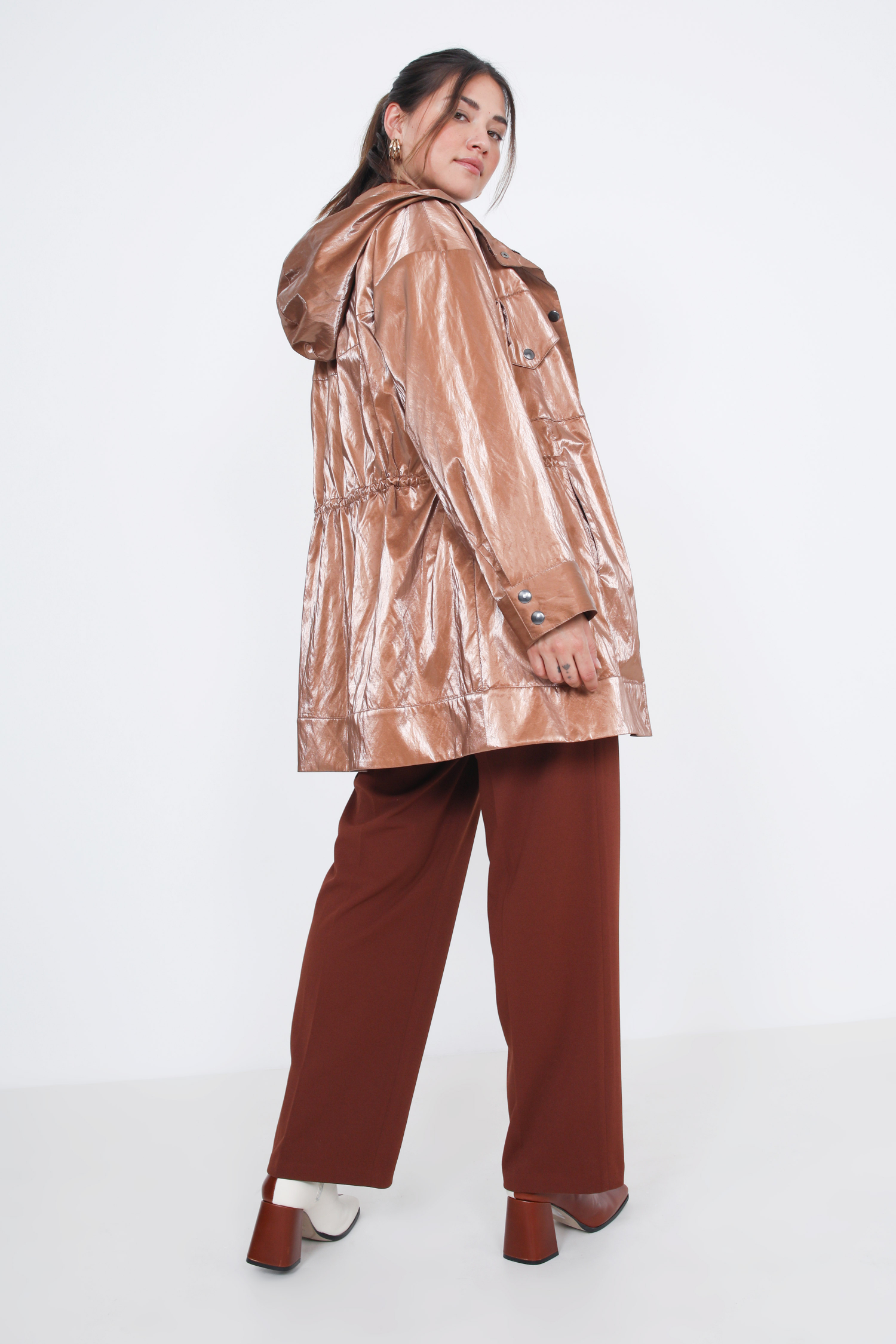 Waterproof vinyl parka with hood.