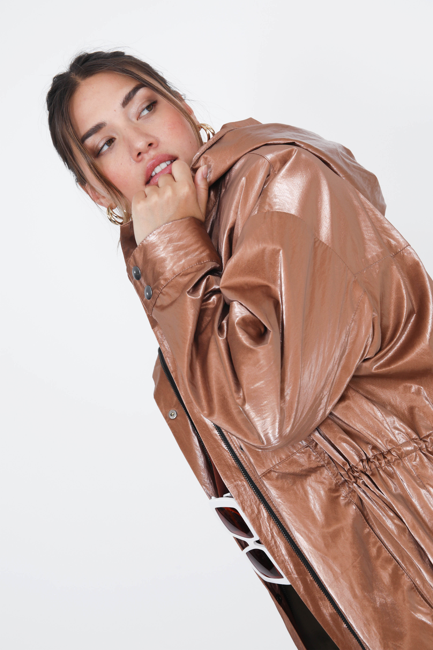 Waterproof vinyl parka with hood.