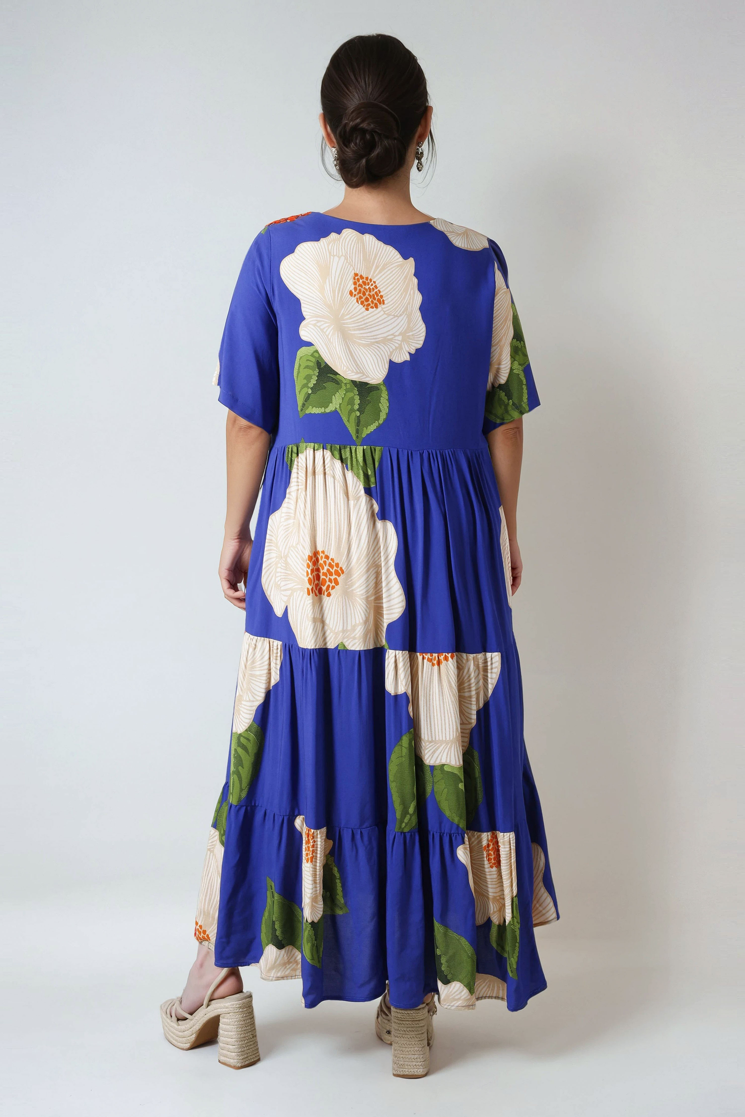 Long bohemian style dress in gradient polka dot print