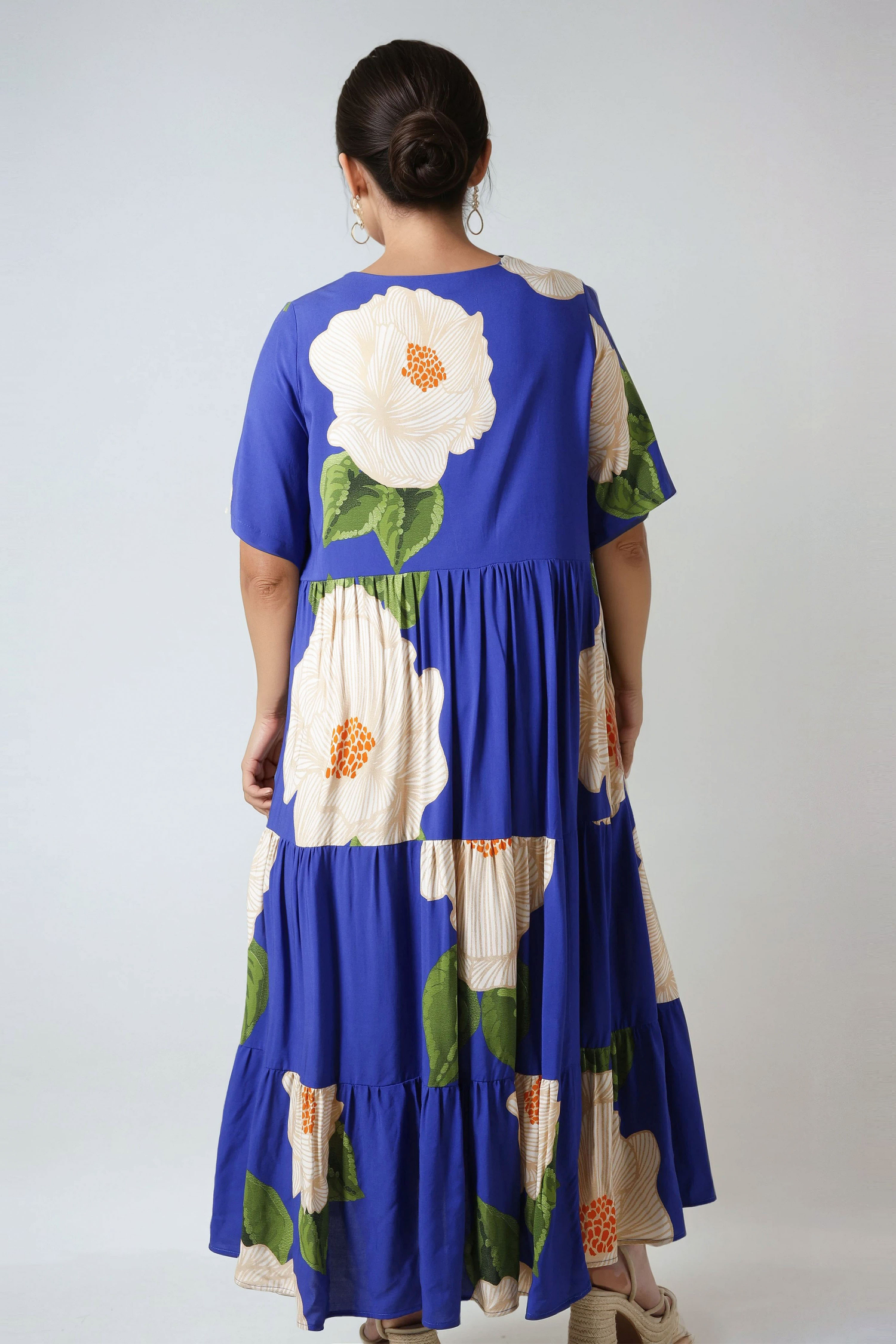 Long bohemian style dress in gradient polka dot print