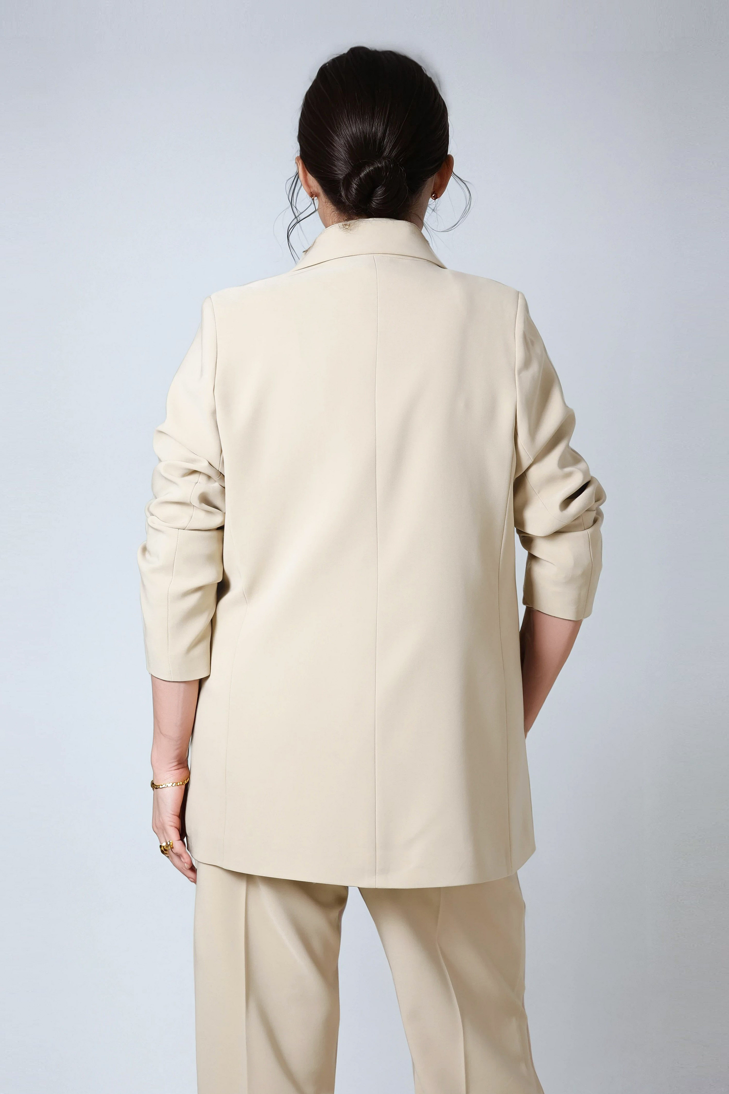 Veste tailleur unie fendue sur les côtés