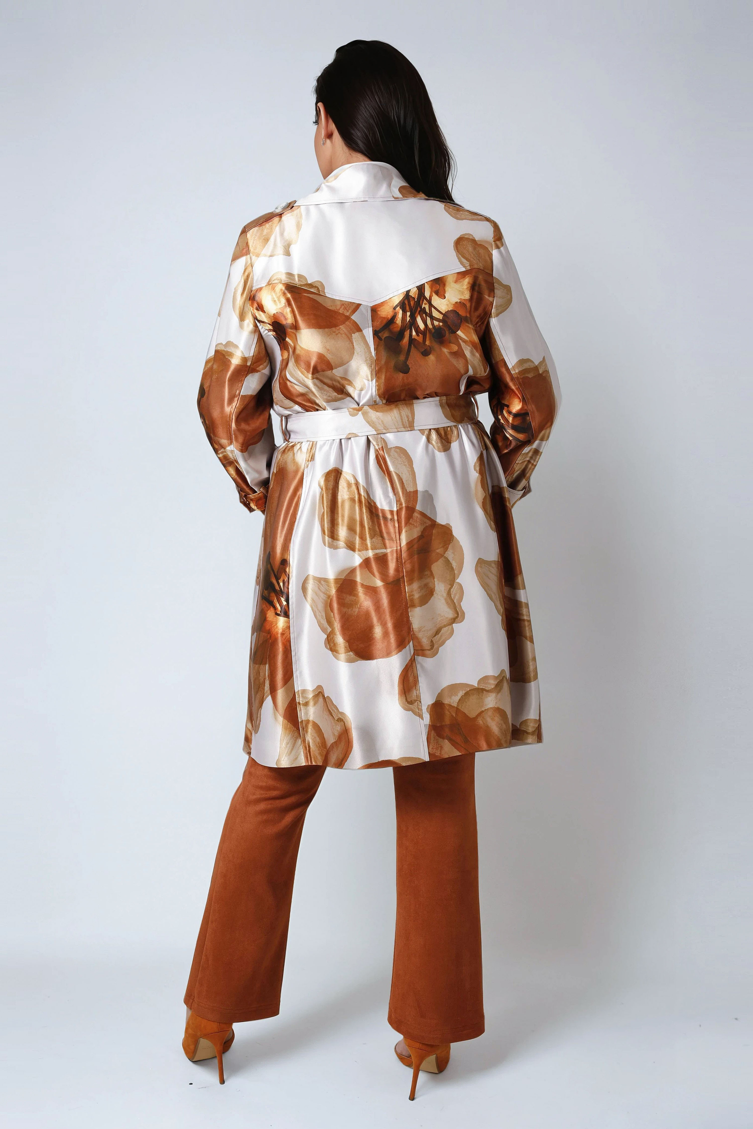 Satin effect trench coat with large flower motif.