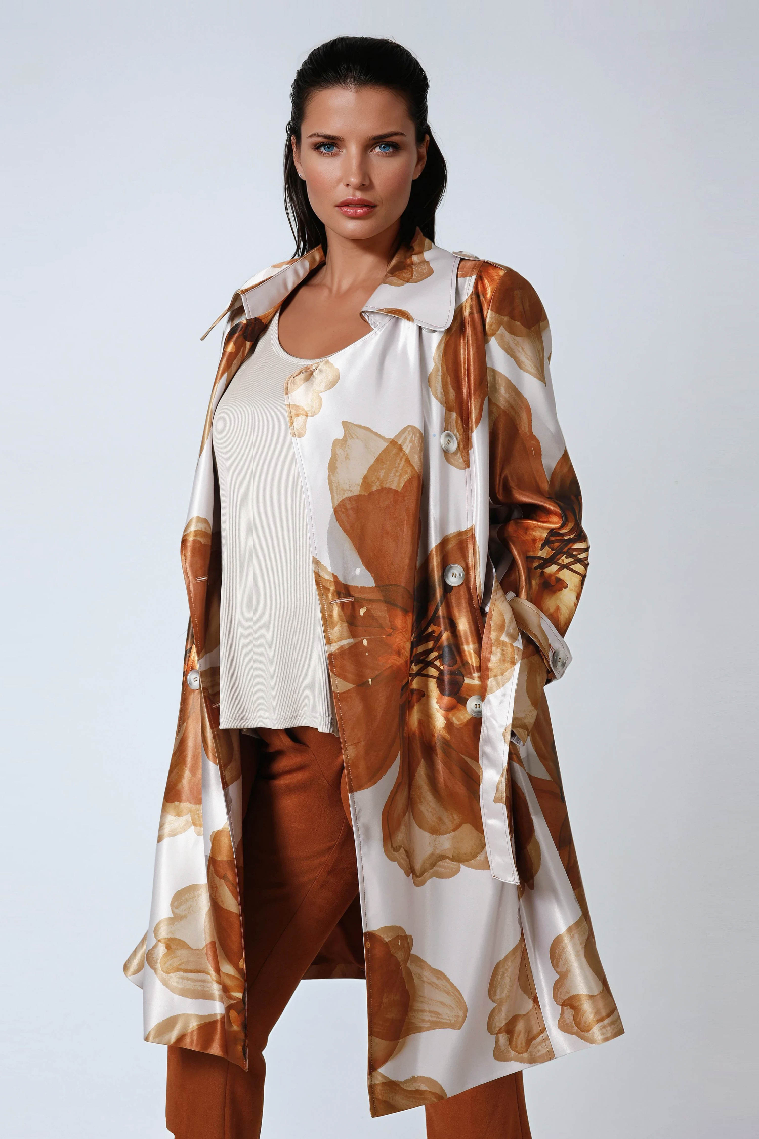 Satin effect trench coat with large flower motif.