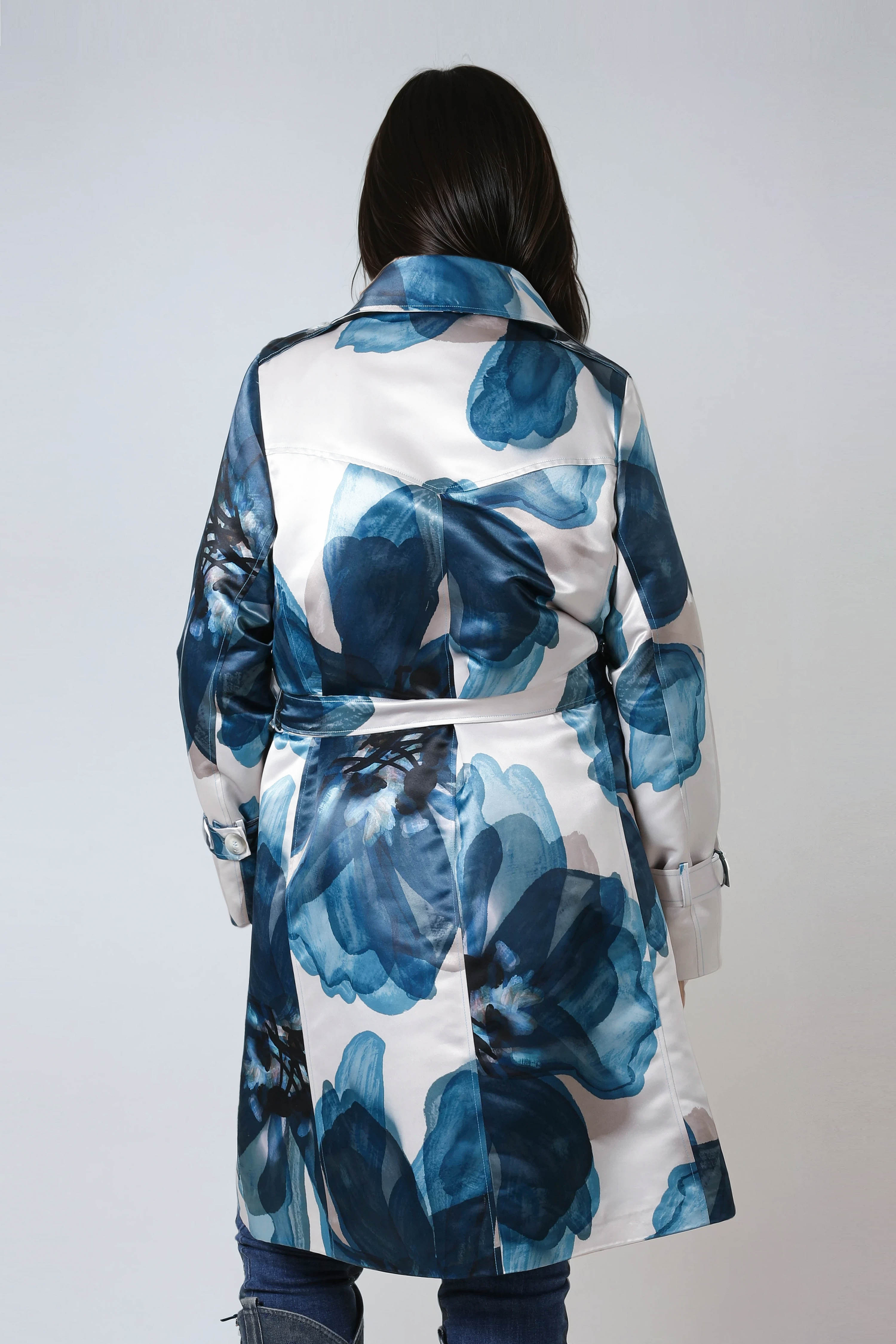 Satin effect trench coat with large flower motif.