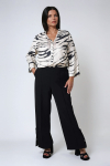 Pantalon tailleur uni avec une patte fantaisie