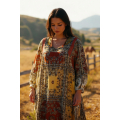 Long printed dress with a bib