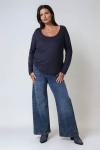 Flared jeans with jeweled pockets