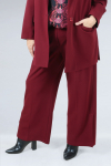 Flowing pants with high slits at the bottom