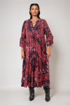 Long bohemian cashmere dress in red and black with flowing fabric and feminine ruffles