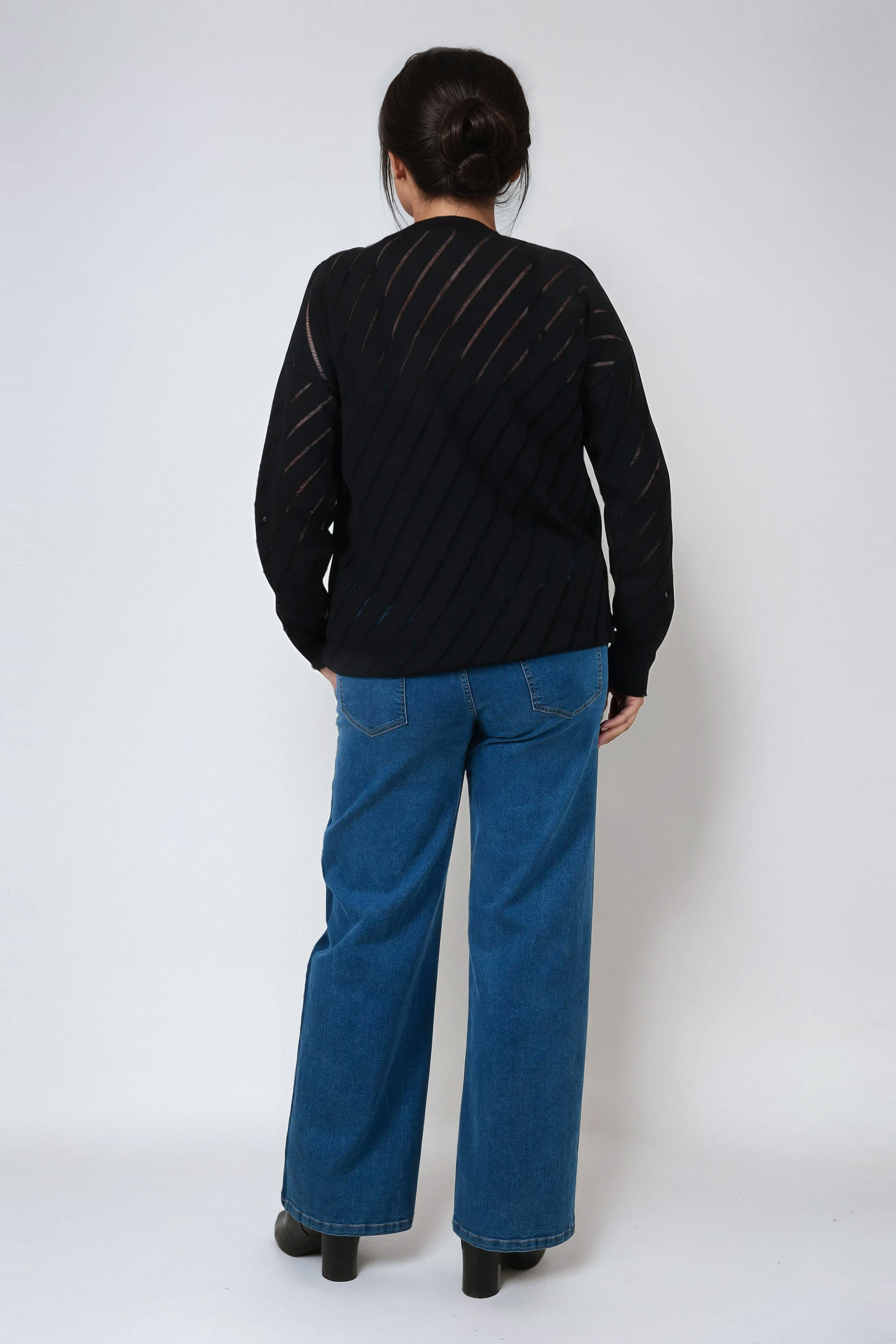Pull uni avec motif en biais