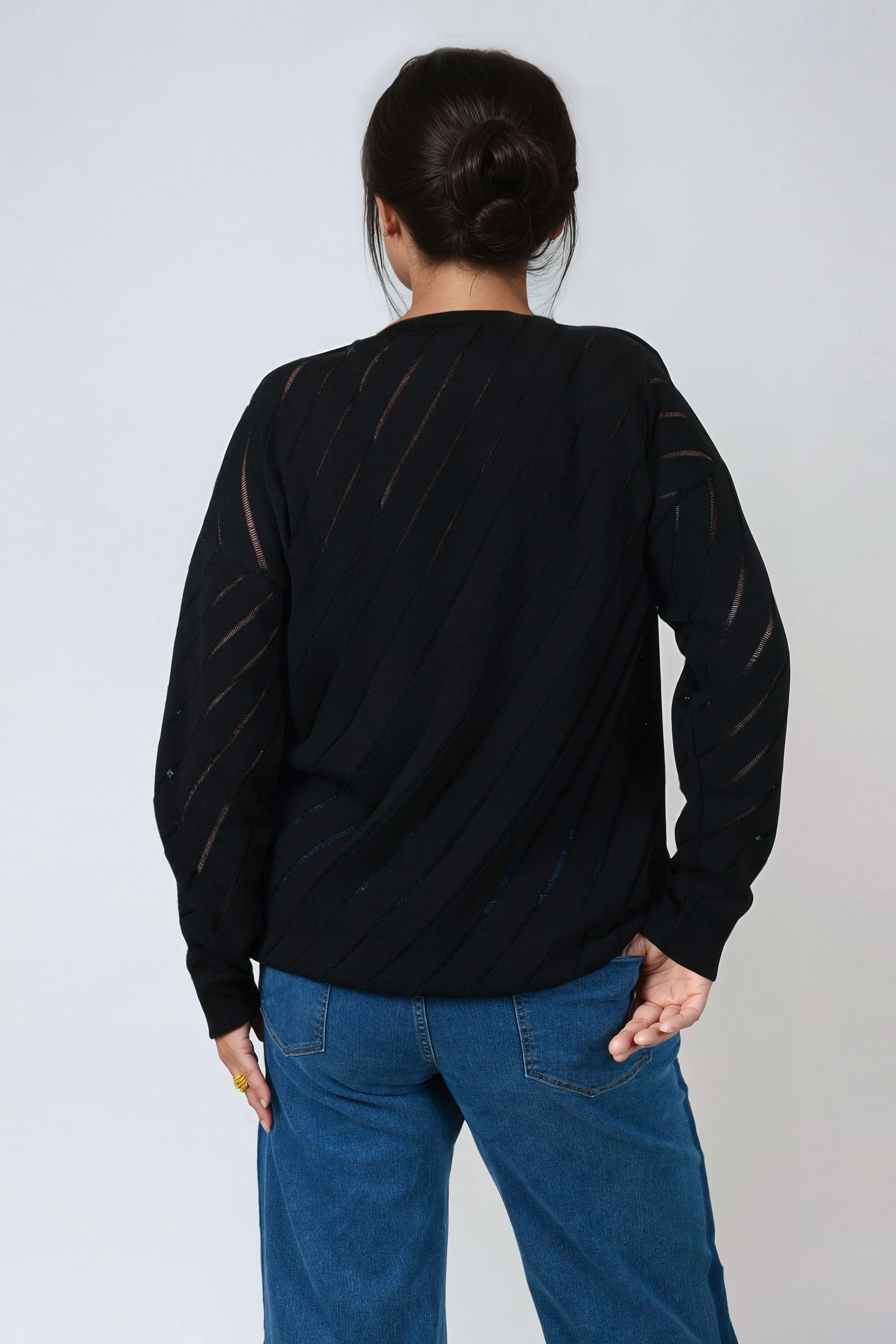 Pull uni avec motif en biais
