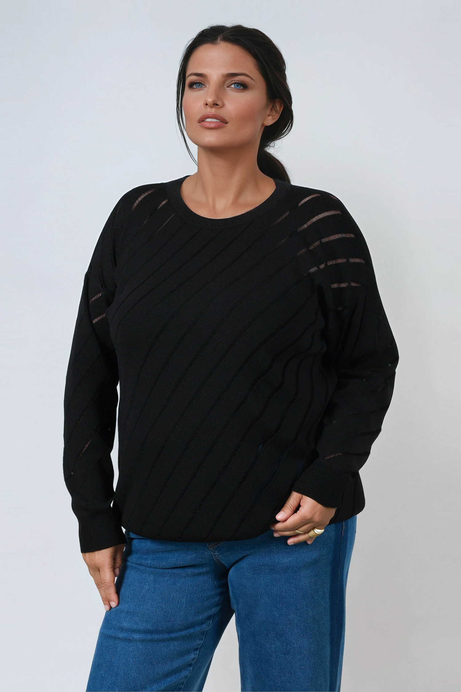 Pull uni avec motif en biais