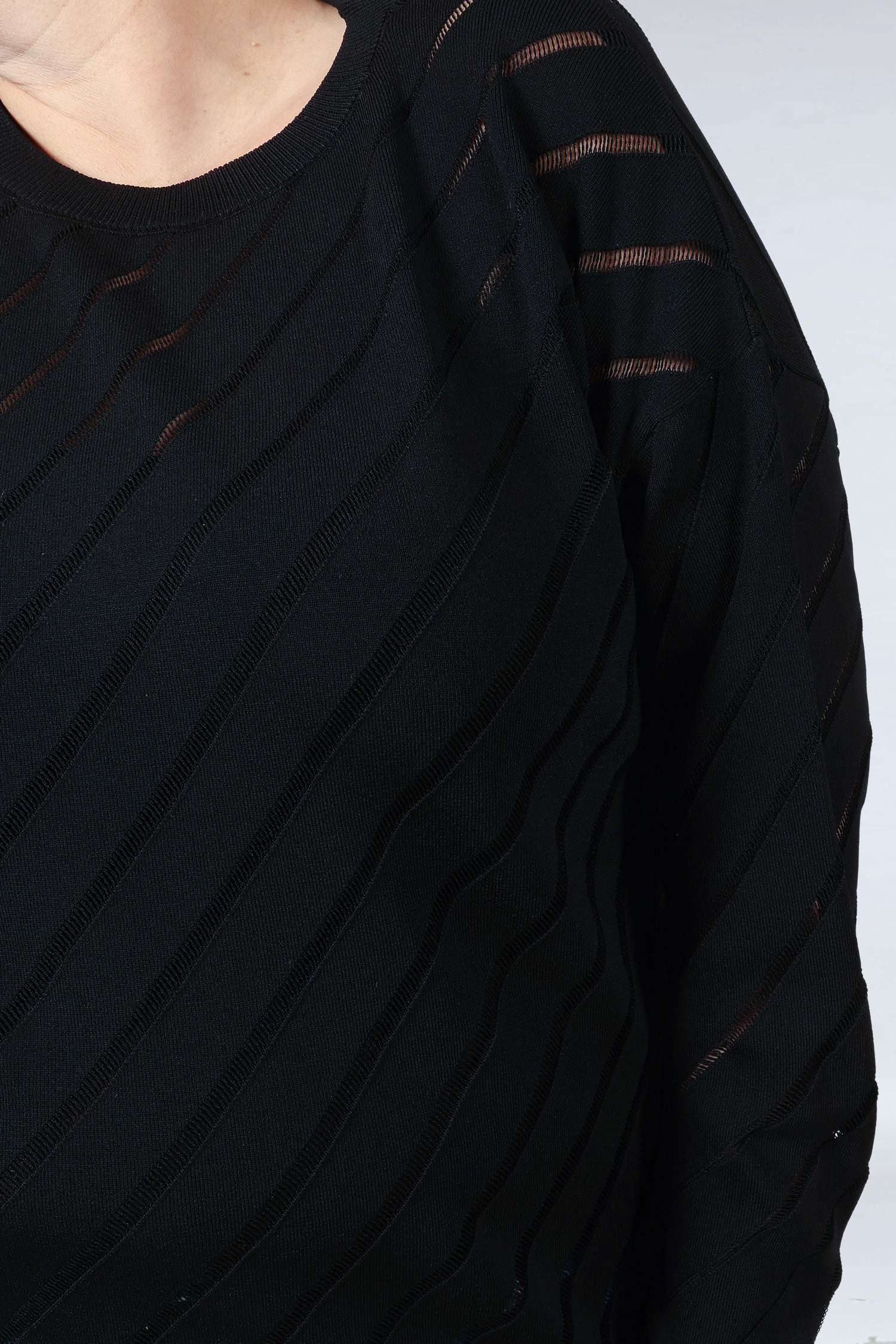 Pull uni avec motif en biais